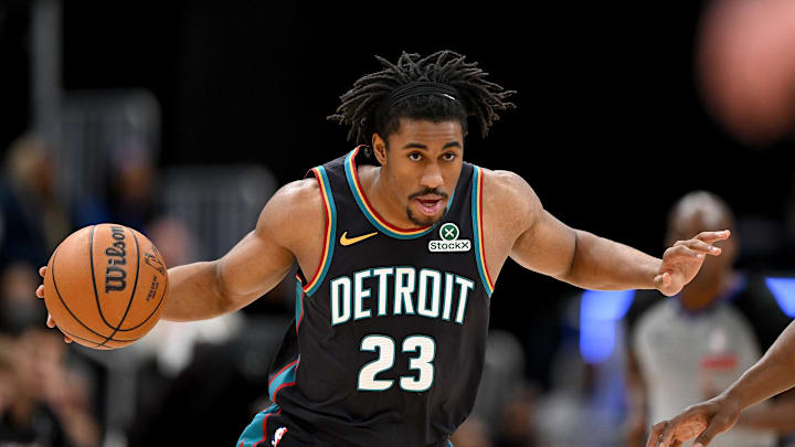 Jan 1, 2026; Detroit, Michigan, USA; Detroit Pistons guard Jaden Ivey (23) takes the ball up the court against the Miami Heat in the first quarter at Little Caesars Arena. Mandatory Credit: Lon Horwedel-Imagn Images