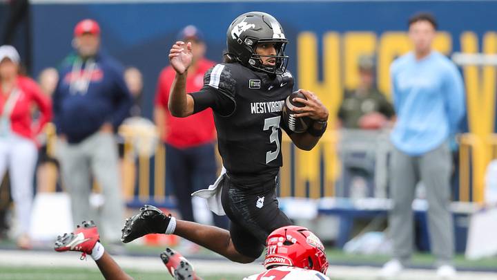 Oct 10, 2026; Morgantown, West Virginia, USA; West Virginia Mountaineers quarterback Michael Hawkins Jr. (3) runs the ball during the first quarter against the Arizona Wildcats at Milan Puskar Stadium. Mandatory Credit: Ben Queen-Imagn Images Oct 10, 2026; Morgantown, West Virginia, USA; West Virginia Mountaineers quarterback Michael Hawkins Jr. (3) runs the ball during the first quarter against the Arizona Wildcats at Milan Puskar Stadium. Mandatory Credit: Ben Queen-Imagn Images