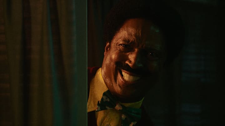 Elvis Nolasco as Mr. Emmanuel Crocket in Mr. Crocket