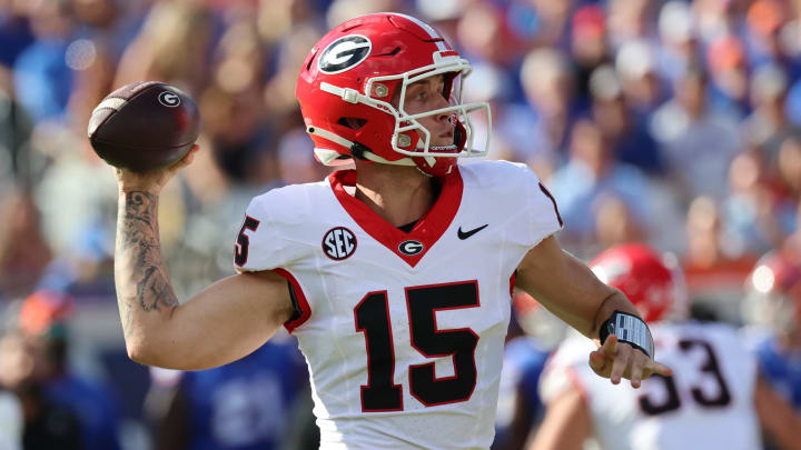 Oct 28, 2023; Jacksonville, Florida, USA; Georgia Bulldogs quarterback Carson Beck (15) looks down field.