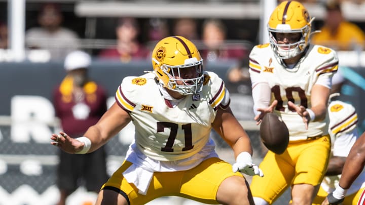 Oct 18, 2025; Tempe, Arizona, USA; Arizona State Sun Devils offensive lineman Makua Pule (71) blocks for quarterback Sam Leavitt (10) against the Texas Tech Red Raiders at Mountain America Stadium. Mandatory Credit: Mark J. Rebilas-Imagn Images Oct 18, 2025; Tempe, Arizona, USA; Arizona State Sun Devils offensive lineman Makua Pule (71) blocks for quarterback Sam Leavitt (10) against the Texas Tech Red Raiders at Mountain America Stadium. Mandatory Credit: Mark J. Rebilas-Imagn Images