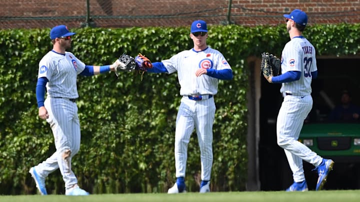 May 26, 2025; Chicago, Illinois, USA; Chicago Cubs left fielder Ian Happ (left), center fielder Pete Crow-Armstrong (center), and right fielder Kyle Tucker (right) celebrate after defeating the Colorado Rockies at Wrigley Field. May 26, 2025; Chicago, Illinois, USA; Chicago Cubs left fielder Ian Happ (left), center fielder Pete Crow-Armstrong (center), and right fielder Kyle Tucker (right) celebrate after defeating the Colorado Rockies at Wrigley Field.