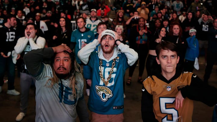 Jacksonville Jaguars fans, from left, Griffin Lasch, Garrett Roberson, and Gabriel Mont react to costly mistakes during the second half Saturday, Jan 21, 2023 at TIAA Bank Field's Dream Finders Homes Flex Field at Daily's Place in Jacksonville, Fla. 