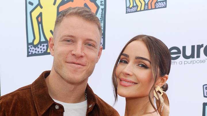 Christian McCaffrey and Olivia Culpo