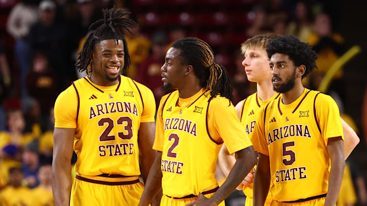 Jan 24, 2026; Tempe, Arizona, USA; Arizona State Sun Devils forward Allen Mukeba (23), guard Anthony Johnson (2) and guard Maurice Odum (5) against the Cincinnati Bearcats at Desert Financial Arena. Mandatory Credit: Mark J. Rebilas-Imagn Images