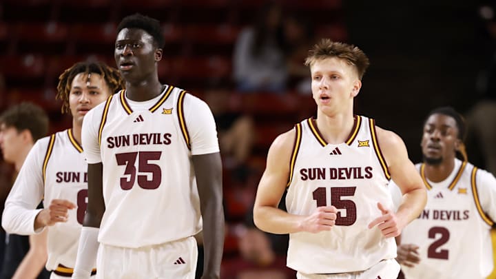 Jan 3, 2026; Tempe, Arizona, USA; Arizona State Sun Devils center Massamba Diop (35) and guard Noah Meeusen (15) against the Colorado Buffaloes at Desert Financial Arena. Mandatory Credit: Mark J. Rebilas-Imagn Images