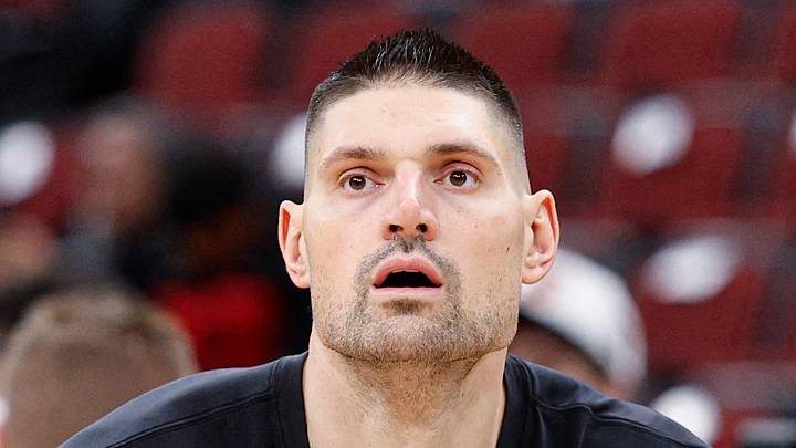 Chicago Bulls center Nikola Vucevic warms up before an NBA game against the Orlando Magic. Chicago Bulls center Nikola Vucevic warms up before an NBA game against the Orlando Magic.