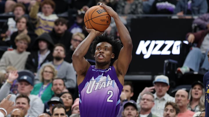 Dec 30, 2024; Salt Lake City, Utah, USA;  Utah Jazz guard Collin Sexton (2) shoots the ball during the second half against the Denver Nuggets at Delta Center. 