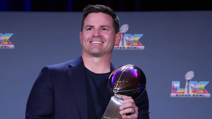 Seattle Seahawks head coach Mike Macdonald poses with the Vince Lombardi trophy