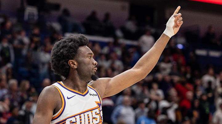 Dec 27, 2025; New Orleans, Louisiana, USA;  New Orleans Pelicans guard Jose Alvarado (not pictured) gets into a scrum with Phoenix Suns center Mark Williams (15) over a play during the second half at Smoothie King Center. Mandatory Credit: Stephen Lew-Imagn Images