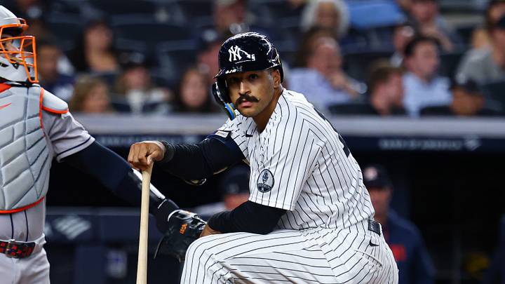Aug 25, 2026; Bronx, New York, USA; New York Yankees center fielder Trent Grisham (12) reacts after nearly being hit by a pitch during the seventh inning against the Houston Astros at Yankee Stadium. Mandatory Credit: Vincent Carchietta-Imagn Images