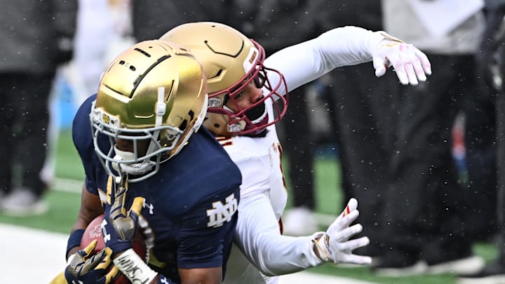 Notre Dame Fighting Irish cornerback Benjamin Morrison intercepts a pass intended for Boston College Eagles wide receiver Joseph Griffin. Notre Dame Fighting Irish cornerback Benjamin Morrison intercepts a pass intended for Boston College Eagles wide receiver Joseph Griffin.