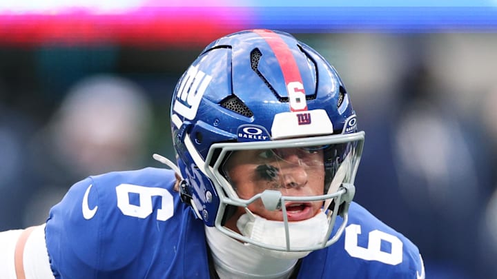 New York Giants quarterback Jaxson Dart scrambles during the fourth quarter against the Dallas Cowboys.