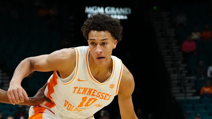 Nov 24, 2025; Las Vegas, NV, USA; Tennessee Volunteers forward Nate Ament (10) is defended by. Rutgers Scarlet Knights forward Dylan Grant (9) during the first half in a 2025 Players Era Festival group play game at MGM Grand Garden Arena. Mandatory Credit: Stephen R. Sylvanie-Imagn Images