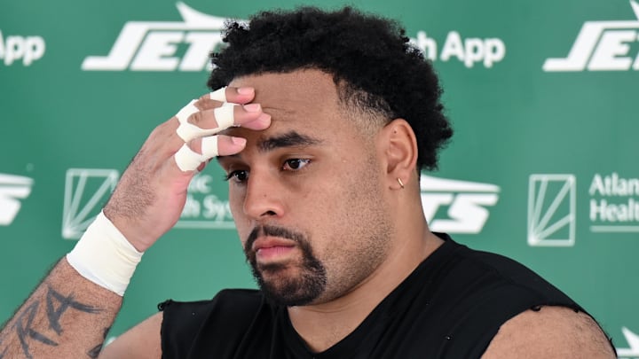 Jul 24, 2025; Florham Park, NY, USA; New York Jets guard Alijah Vera-Tucker (75) speaks to the media during training camp at Atlantic Health Jets Training Center. Mandatory Credit: John Jones-Imagn Images