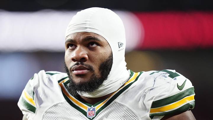 Dec 14, 2025; Denver, Colorado, USA; Green Bay Packers defensive end Micah Parsons (1) walks off the field with help from medical personnel following an injury during the third quarter against the Denver Broncos at Empower Field at Mile High. Mandatory Credit: Ron Chenoy-Imagn Images