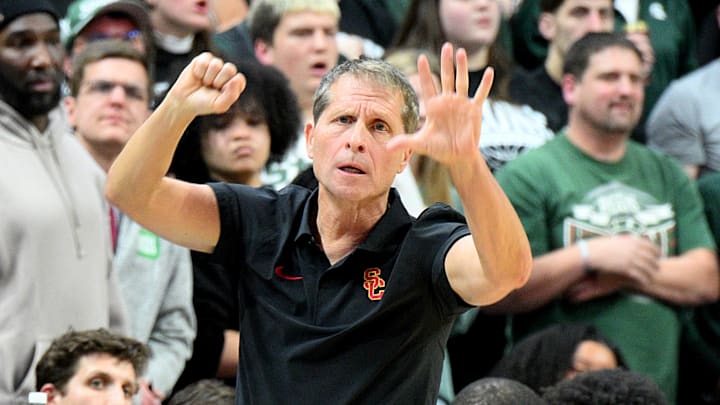 Jan 5, 2026; East Lansing, Michigan, USA;  Southern California Trojans head coach Eric Musselman sends in a play against the Michigan State Spartans during the first half at Jack Breslin Student Events Center. Mandatory Credit: Dale Young-Imagn Images
