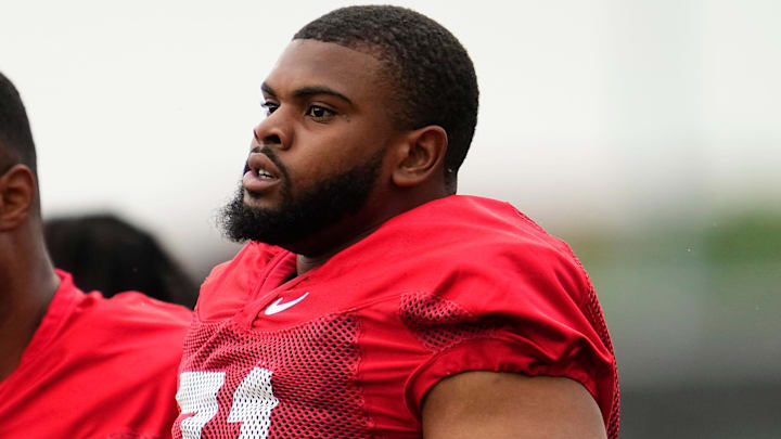 Ohio State Buckeyes offensive lineman Jayvon McFadden (71) and offensive lineman Deontae Armstrong (72) run during the first football practice of the season at the Woody Hayes Athletic Center on July 31, 2025.