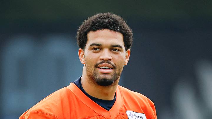 Aug 5, 2026; Lake Forest, IL, USA; Chicago Bears quarterback Caleb Williams (18) stands on the field during training camp at Halas Hall. Mandatory Credit: Kamil Krzaczynski-Imagn Images Aug 5, 2026; Lake Forest, IL, USA; Chicago Bears quarterback Caleb Williams (18) stands on the field during training camp at Halas Hall. Mandatory Credit: Kamil Krzaczynski-Imagn Images