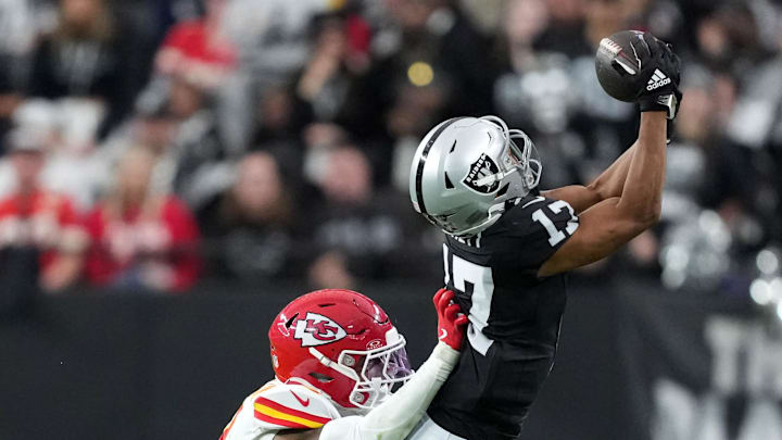 Jan 4, 2026; Paradise, Nevada, USA; Las Vegas Raiders wide receiver Tyler Lockett (17) attempts to catch the ball against Kansas City Chiefs cornerback Kristian Fulton (8) in the first half at Allegiant Stadium. Mandatory Credit: Kirby Lee-Imagn Images
