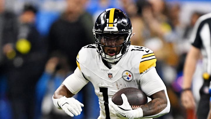 Dec 21, 2025; Detroit, Michigan, USA; Pittsburgh Steelers running back Kenneth Gainwell (14) runs the ball during the first quarter against the Detroit Lions at Ford Field. Mandatory Credit: Lon Horwedel-Imagn Images