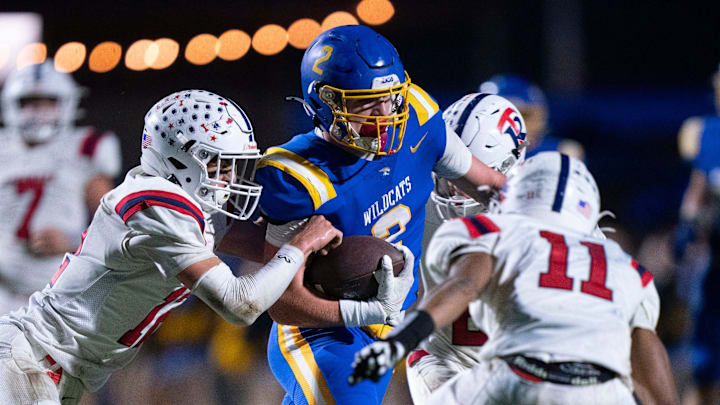 DCA's Carson Sneed (2) runs after a catch with Tipton-Rosemark's Tanner Thornell (12) trying to tackle him during their Division II-A playoff game at Donelson Christian Academy in Nashville, Tenn., Friday, Nov. 8, 2024.