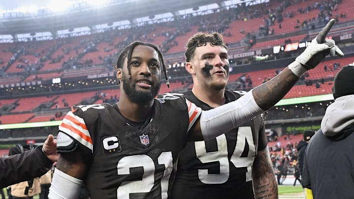 Cleveland Browns defenders Denzel Ward, left, and Mason Graham