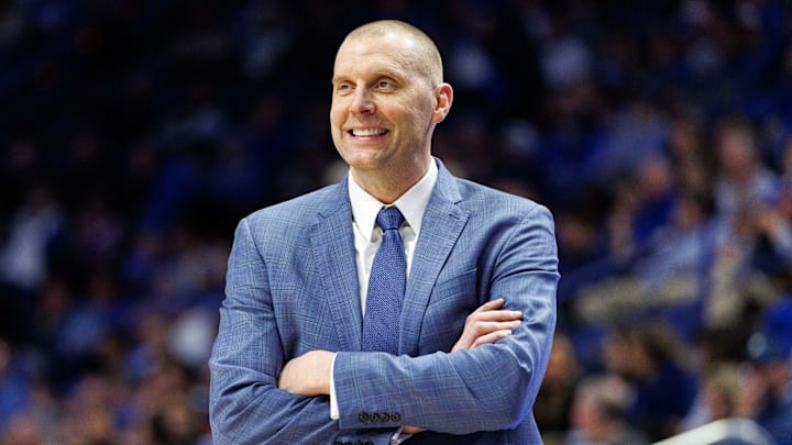 Feb 8, 2025; Lexington, Kentucky, USA; Kentucky Wildcats head coach Mark Pope smiles as he watches the action during the second half against the South Carolina Gamecocks at Rupp Arena at Central Bank Center. Mandatory Credit: Jordan Prather-Imagn Images Feb 8, 2025; Lexington, Kentucky, USA; Kentucky Wildcats head coach Mark Pope smiles as he watches the action during the second half against the South Carolina Gamecocks at Rupp Arena at Central Bank Center. Mandatory Credit: Jordan Prather-Imagn Images