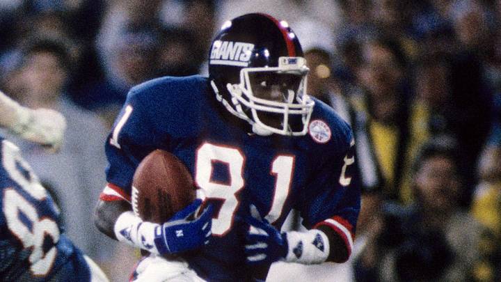 Jan 25, 1987; Pasadena, CA, USA; FILE PHOTO; New York Giants receiver Stacy Robinson (81) carries the ball against the Denver Broncos during Super Bowl XXI at the Rose Bowl. The Giants defeated the Broncos 39-20.  