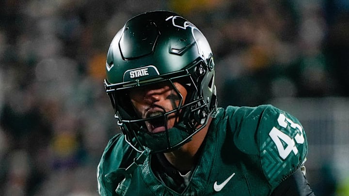 Oct 25, 2025; East Lansing, Michigan, USA; Michigan State Spartans safety Malik Spencer (43) reacts after a third down defensive play against the Michigan Wolverines during the first half at Spartan Stadium.