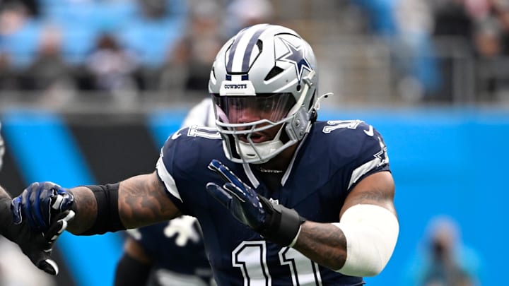 Dec 15, 2024; Charlotte, North Carolina, USA; Dallas Cowboys linebacker Micah Parsons (11) rushes as Carolina Panthers offensive tackle Taylor Moton (72) defends in the first quarter at Bank of America Stadium. Mandatory Credit: Bob Donnan-Imagn Images Dec 15, 2024; Charlotte, North Carolina, USA; Dallas Cowboys linebacker Micah Parsons (11) rushes as Carolina Panthers offensive tackle Taylor Moton (72) defends in the first quarter at Bank of America Stadium. Mandatory Credit: Bob Donnan-Imagn Images