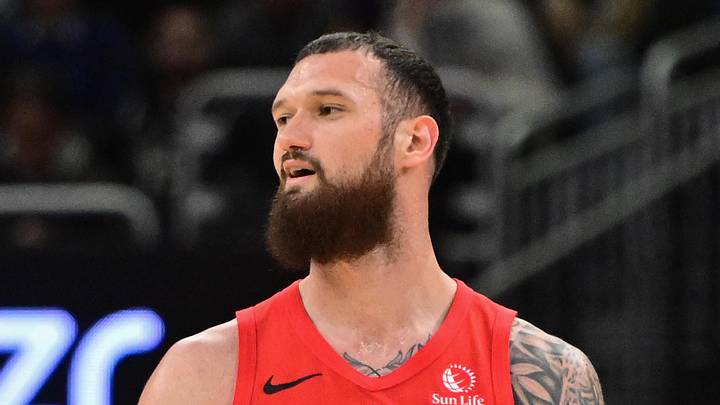 Feb 22, 2026; Milwaukee, Wisconsin, USA; Toronto Raptors forward Sandro Mamukelashvili (54) reacts after scoring a basket in the fourth quarter against the Milwaukee Bucks at Fiserv Forum. Mandatory Credit: Benny Sieu-Imagn Images