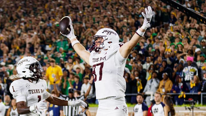 Texas A&M tight end Nate Boerkircher (87) celebrates after scoring a touchdown to tie the game in the second half of a NCAA football game against Notre Dame at Notre Dame Stadium on Saturday, Sept. 13, 2025, in South Bend. The extra point scored after this touchdown put Texas A&M ahead 41-40 to win the game.