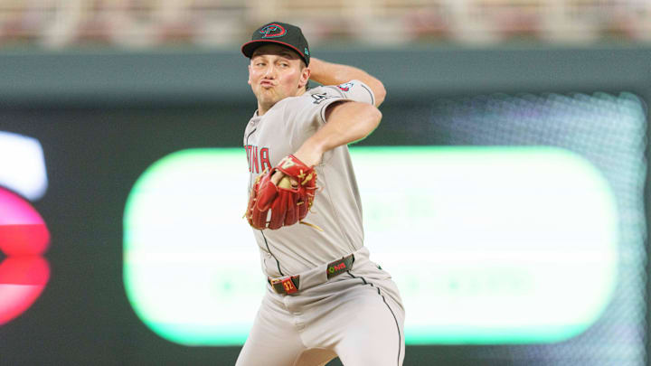 Sep 12, 2025; Minneapolis, Minnesota, USA; Arizona Diamondbacks starting pitcher Brandon Pfaadt (32) pitches to Minnesota Twins left fielder Austin Martin (16) in the first inning at Target Field. Mandatory Credit: Matt Blewett-Imagn Images