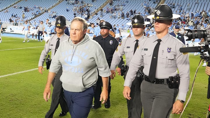 Sep 1, 2025; Chapel Hill, North Carolina, USA; North Carolina Tar Heels head coach Bill Belichick walks to center field after the game at Kenan Stadium. Sep 1, 2025; Chapel Hill, North Carolina, USA; North Carolina Tar Heels head coach Bill Belichick walks to center field after the game at Kenan Stadium.
