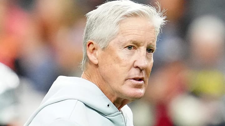 Jan 4, 2026; Paradise, Nevada, USA; Las Vegas Raiders head coach Pete Carroll observes warm ups before the start of a game against the Kansas City Chiefs at Allegiant Stadium. Mandatory Credit: Stephen R. Sylvanie-Imagn Images
