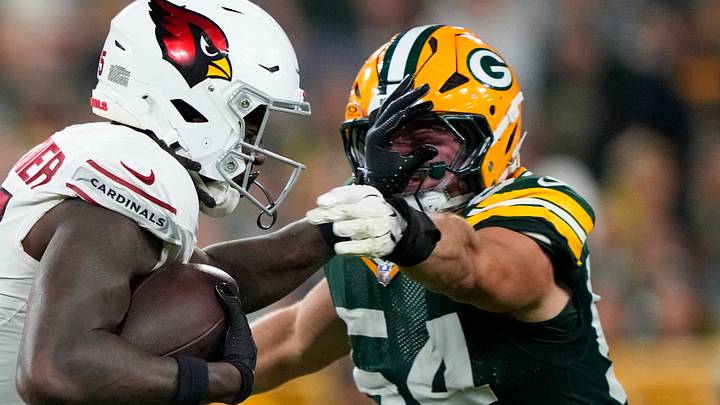 Arizona Cardinals tight end Rivaldo Fairweather (45) stiff-arms Green Bay Packers linebacker Kristian Welch. Arizona Cardinals tight end Rivaldo Fairweather (45) stiff-arms Green Bay Packers linebacker Kristian Welch.