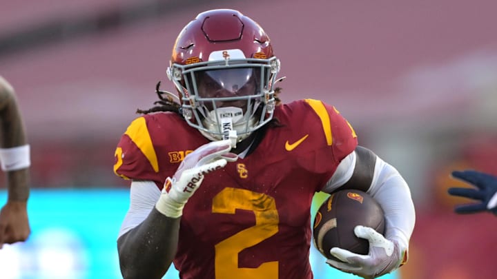 Sep 6, 2025; Los Angeles, California, USA; USC Trojans running back Waymond Jordan (2) Georgia Southern Eagles defensive back Ayden Jackson (5) and runs into the end zone for a touchdown during the second half at the Los Angeles Memorial Coliseum. Mandatory Credit: Jayne Kamin-Oncea-Imagn Images