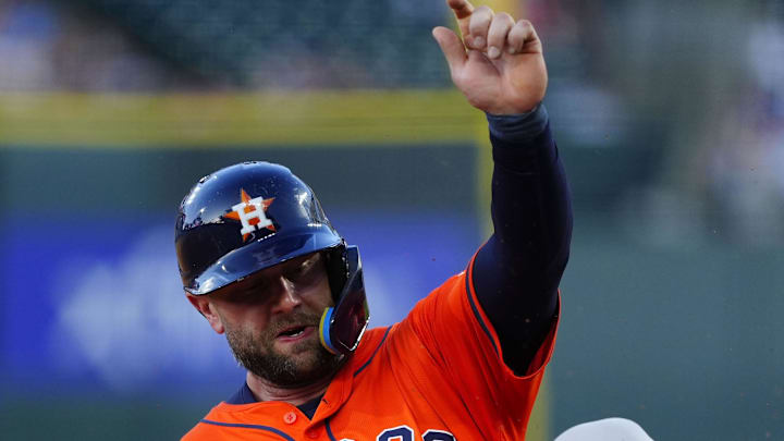 Houston Astros first base Christian Walker (8) slides into third in the fifth inning against the Colorado Rockies at Coors Field on July 2. Houston Astros first base Christian Walker (8) slides into third in the fifth inning against the Colorado Rockies at Coors Field on July 2.
