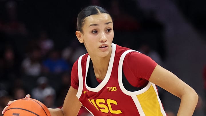 Nov 9, 2025; Charlotte, North Carolina, USA; Southern California Trojans guard Jazzy Davidson (9) dribbles the ball against the NC State Wolfpack during the fourth quarter of the Ally Tipoff game at Spectrum Center. Mandatory Credit: Cory Knowlton-Imagn Images