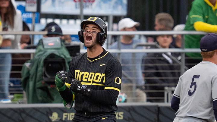 Angel Laya celebrates a triple in a game during the 2026 Eugene Regional Angel Laya celebrates a triple in a game during the 2026 Eugene Regional