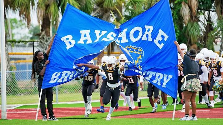 Bayshore senior running back Jashun Judge leads the Bruins onto the field at Balvanz Stadium. Bayshore senior running back Jashun Judge leads the Bruins onto the field at Balvanz Stadium.