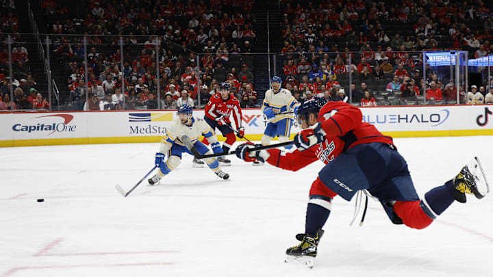 Feb 27, 2025; Washington, District of Columbia, USA; Washington Capitals left wing Alex Ovechkin (8) shoots the puck against the St. Louis Blues in the first period at Capital One Arena. Mandatory Credit: Geoff Burke-Imagn Images