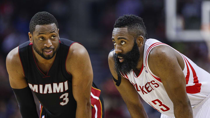 Jan 3, 2015; Houston, TX, USA; Miami Heat guard Dwyane Wade (3) and Houston Rockets guard James Harden (13) talk during the second quarter at Toyota Center. Mandatory Credit: Troy Taormina-Imagn Images Jan 3, 2015; Houston, TX, USA; Miami Heat guard Dwyane Wade (3) and Houston Rockets guard James Harden (13) talk during the second quarter at Toyota Center. Mandatory Credit: Troy Taormina-Imagn Images