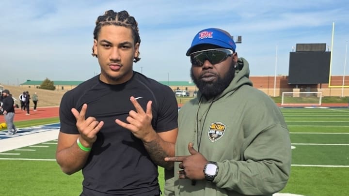 Joel Queisser and Coach at practice for the Military Appreciation Bowl 