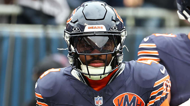 Oct 19, 2025; Chicago, Illinois, USA; Chicago Bears running back D'Andre Swift (4) reacts after rushing for a touchdown against the New Orleans Saints during the second quarter at Soldier Field.