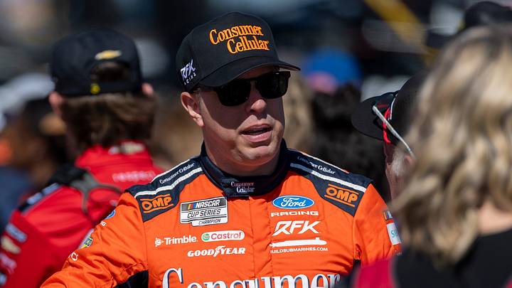 NASCAR Cup Series driver Brad Keselowski (6) greets fans before the first stage of the YellaWood 500 NASCAR Cup Series race at Talladega Superspeedway.  Vasha Hunt-Imagn Images