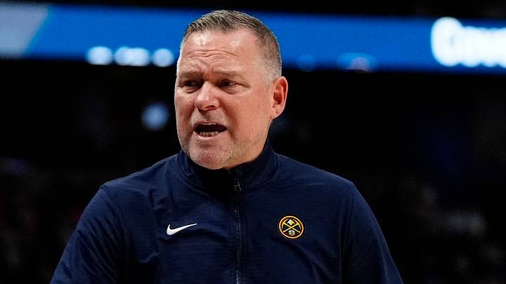 Feb 20, 2025; Denver, Colorado, USA; Denver Nuggets head coach Michael Malone calls out in the second half against the Charlotte Hornets at Ball Arena. Mandatory Credit: Ron Chenoy-Imagn Images
