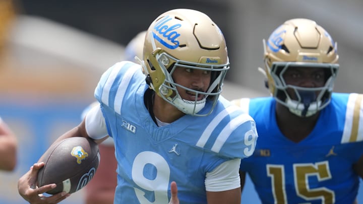May 2, 2026; Pasadena, CA, USA; UCLA Bruins quarterback Nico Iamaleava (9) carries the ball during the spring game at Rose Bowl. Mandatory Credit: Kirby Lee-Imagn Images May 2, 2026; Pasadena, CA, USA; UCLA Bruins quarterback Nico Iamaleava (9) carries the ball during the spring game at Rose Bowl. Mandatory Credit: Kirby Lee-Imagn Images