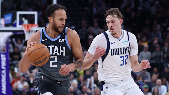 Jan 8, 2026; Salt Lake City, Utah, USA; Utah Jazz forward Kyle Anderson (2) brings the ball up the court against Dallas Mavericks forward Cooper Flagg (32) during the second half at Delta Center. Mandatory Credit: Rob Gray-Imagn Images